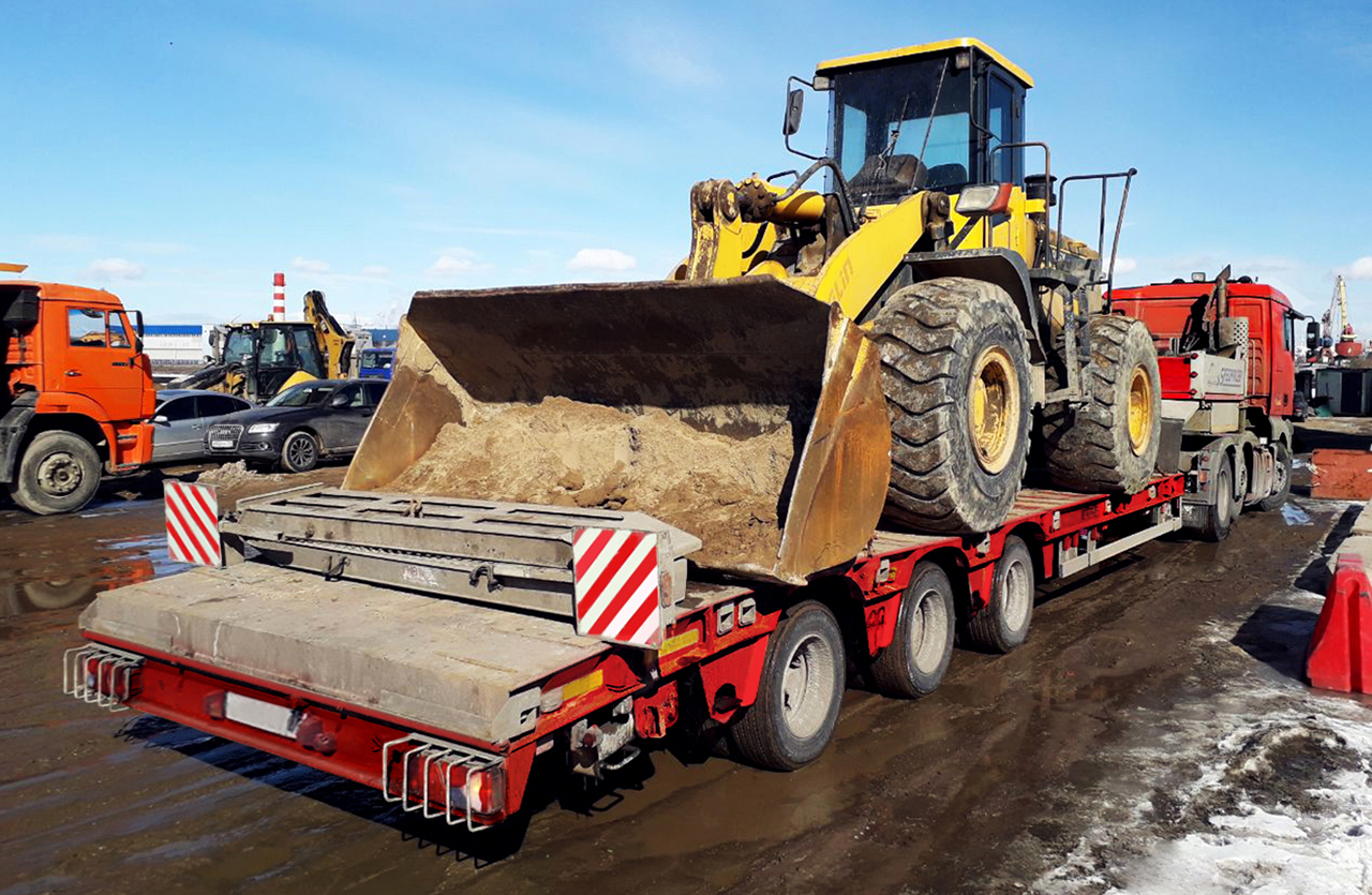 Перевозка строительной спецтехники с помощью полуприцепа
